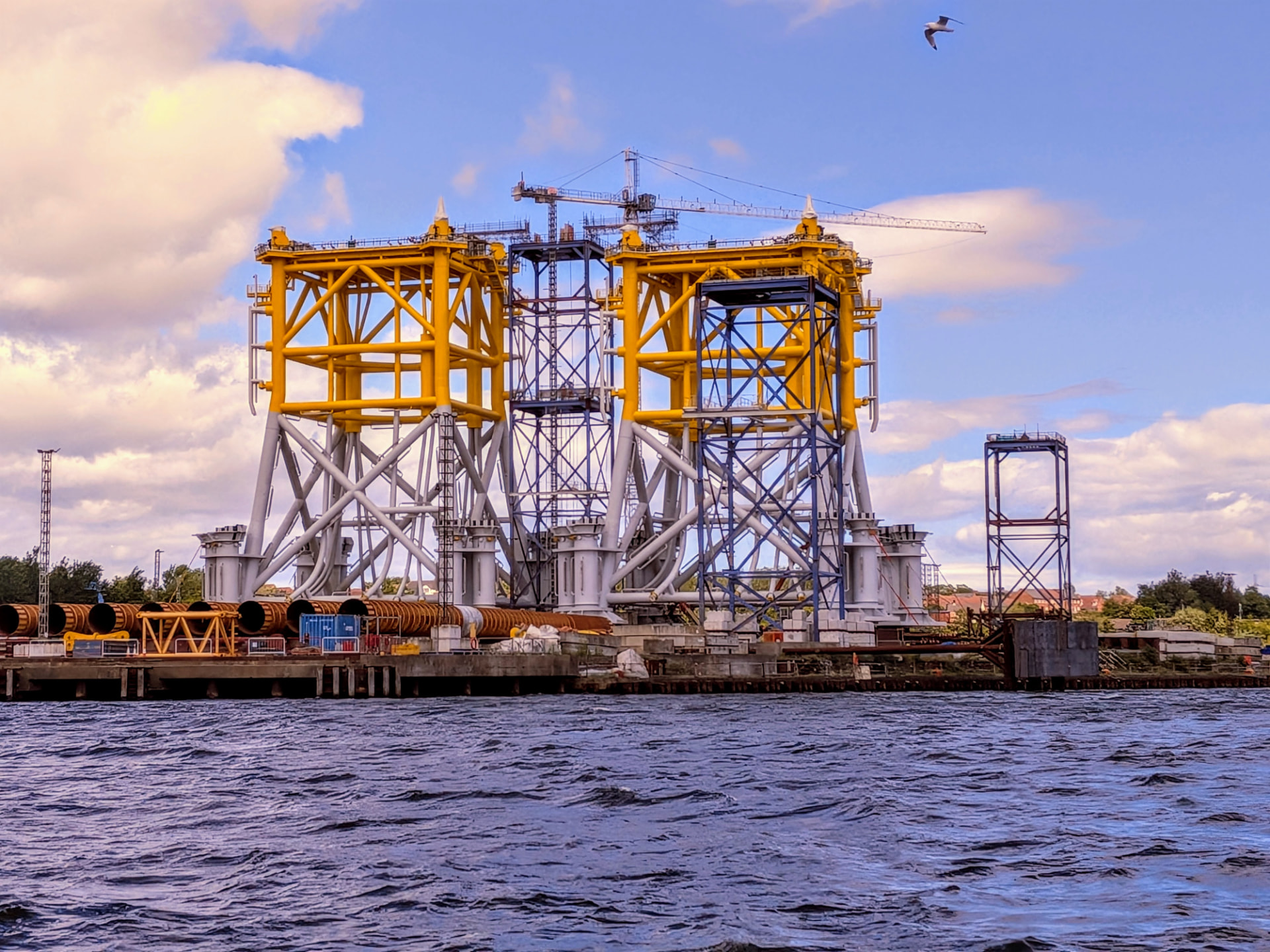 Jacket foundations under fabrication on the quayside